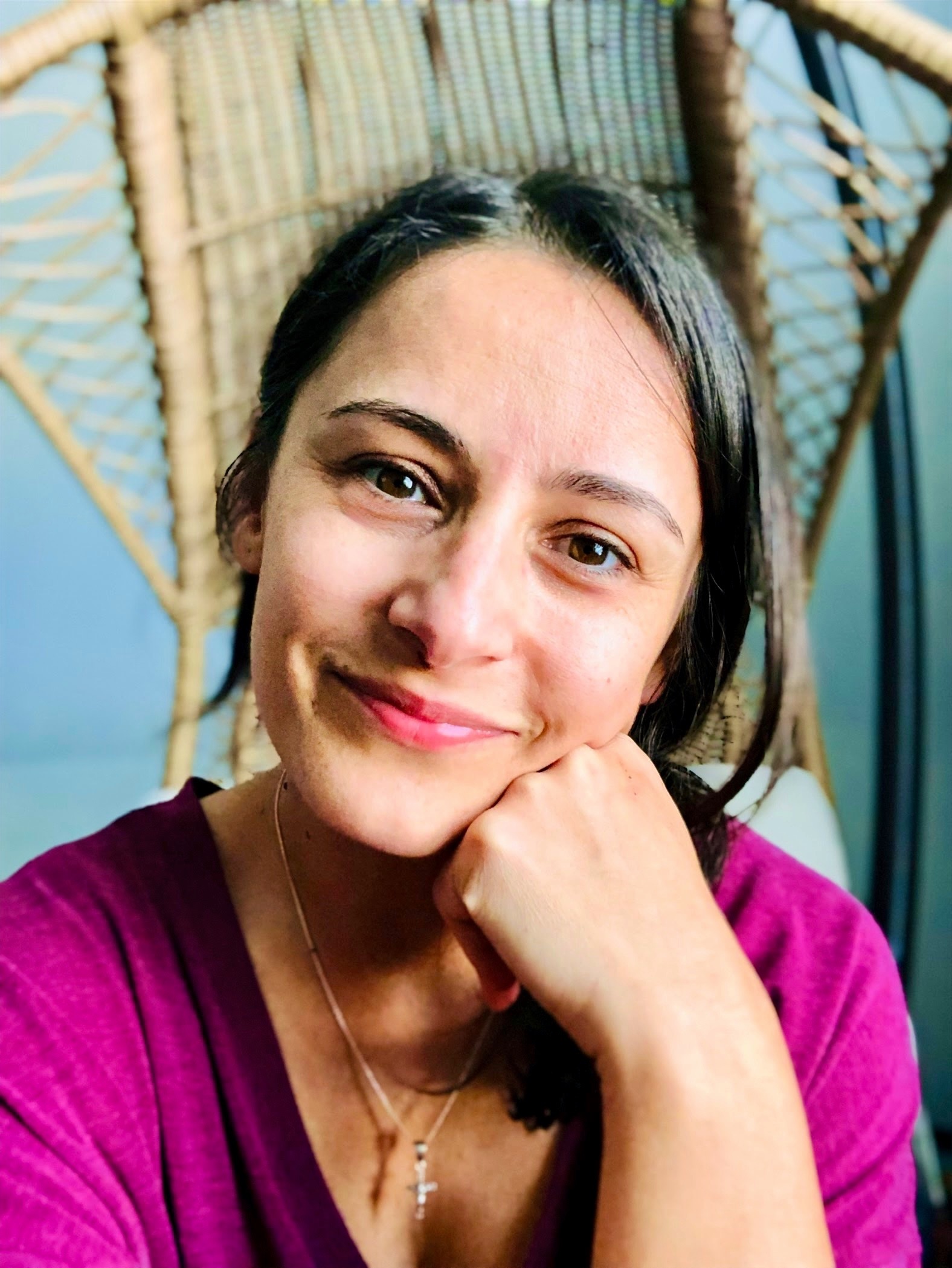 Image of a woman smiling at the camera